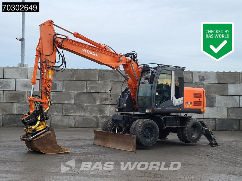 Hitachi ZX140W -3 - Ekskavator roda: gambar 1 Hitachi ZX140W -3 - Ekskavator roda: gambar 1