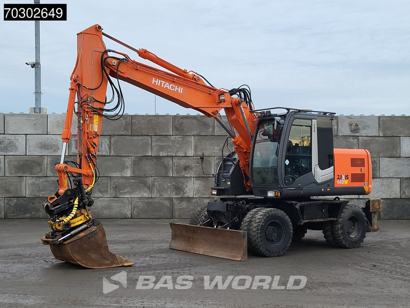 Hitachi ZX140W -3 - Ekskavator roda: gambar 2 Hitachi ZX140W -3 - Ekskavator roda: gambar 2
