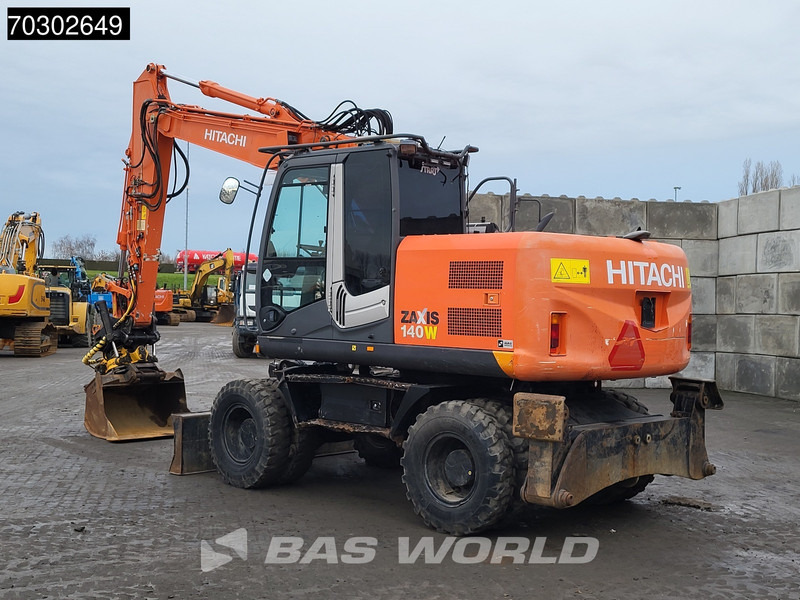 Hitachi ZX140W -3 - Ekskavator roda: gambar 5 Hitachi ZX140W -3 - Ekskavator roda: gambar 5
