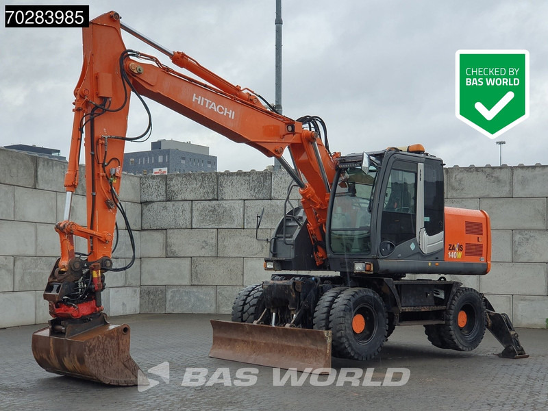 Hitachi ZX140W -3 OUTRIGGERS - ROTOTILT - Ekskavator roda: gambar 1 Hitachi ZX140W -3 OUTRIGGERS - ROTOTILT - Ekskavator roda: gambar 1