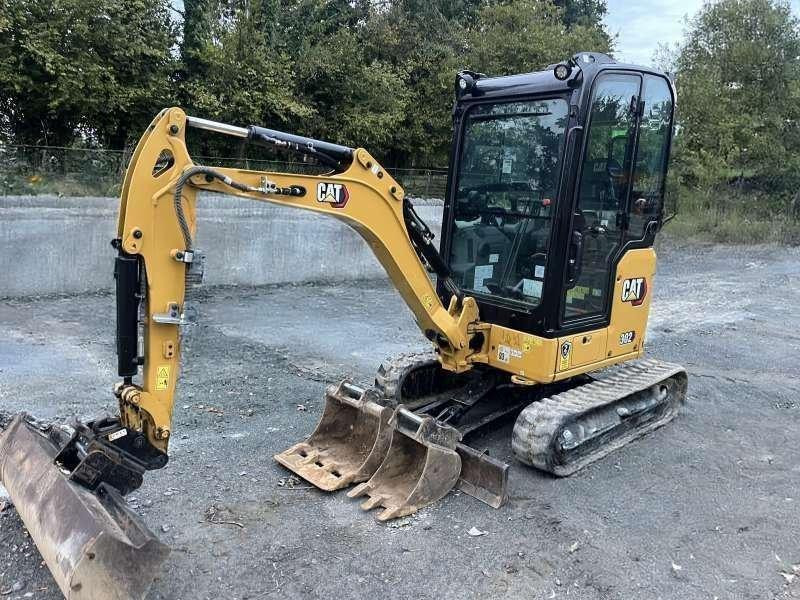 Caterpillar 302 - Ekskavator mini: gambar 1 Caterpillar 302 - Ekskavator mini: gambar 1