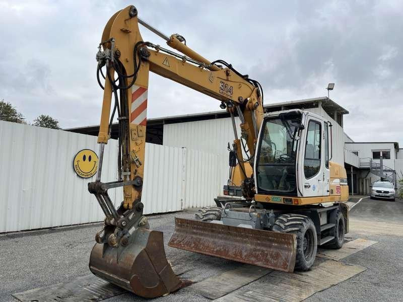 Liebherr A314 Litronic - Ekskavator roda: gambar 2 Liebherr A314 Litronic - Ekskavator roda: gambar 2