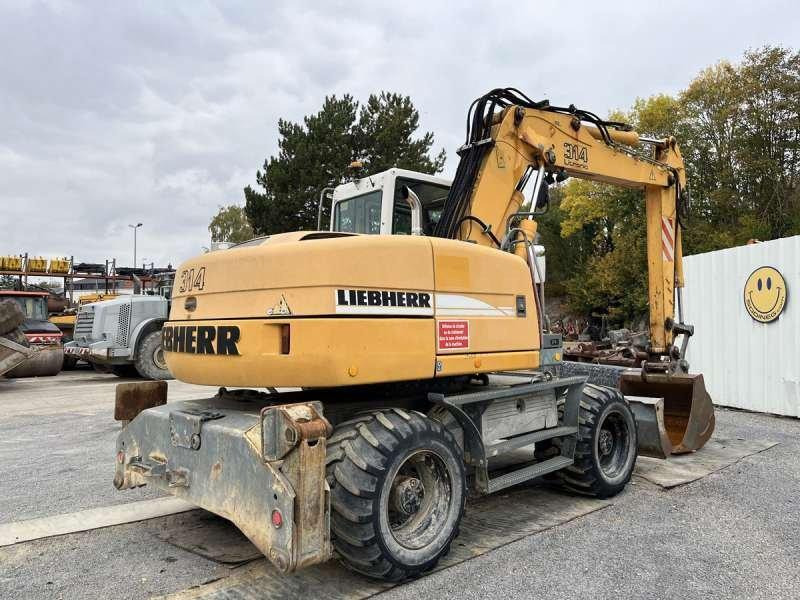 Liebherr A314 Litronic - Ekskavator roda: gambar 5 Liebherr A314 Litronic - Ekskavator roda: gambar 5