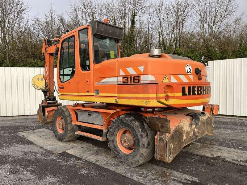 Liebherr A316 LITRONIC - Ekskavator roda: gambar 4 Liebherr A316 LITRONIC - Ekskavator roda: gambar 4