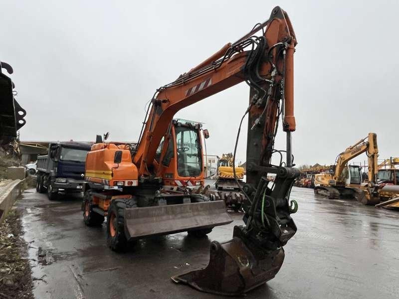 Volvo EW140D - Ekskavator roda: gambar 5 Volvo EW140D - Ekskavator roda: gambar 5