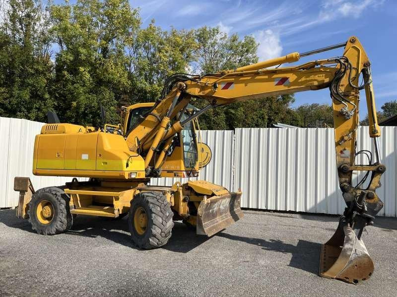 Volvo EW140D - Ekskavator roda: gambar 1 Volvo EW140D - Ekskavator roda: gambar 1
