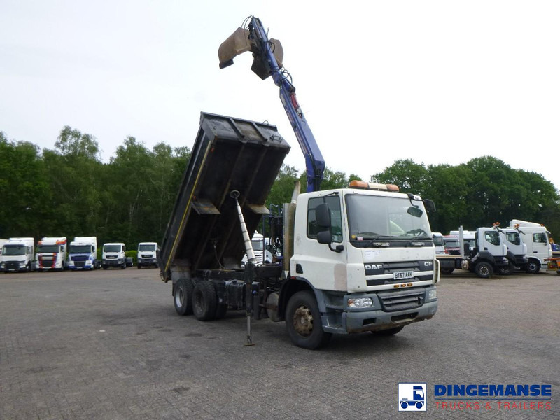 DAF CF 75.310 6x4 RHD tipper + HMF 1144 K-1 + grapple - Truk derek: gambar 2 DAF CF 75.310 6x4 RHD tipper + HMF 1144 K-1 + grapple - Truk derek: gambar 2