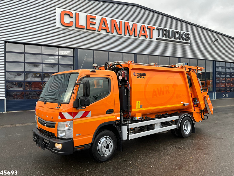 FUSO Canter 9C18 Euro 6 Zoeller 7m³ Just 176.158 km! - Truk sampah: gambar 1 FUSO Canter 9C18 Euro 6 Zoeller 7m³ Just 176.158 km! - Truk sampah: gambar 1