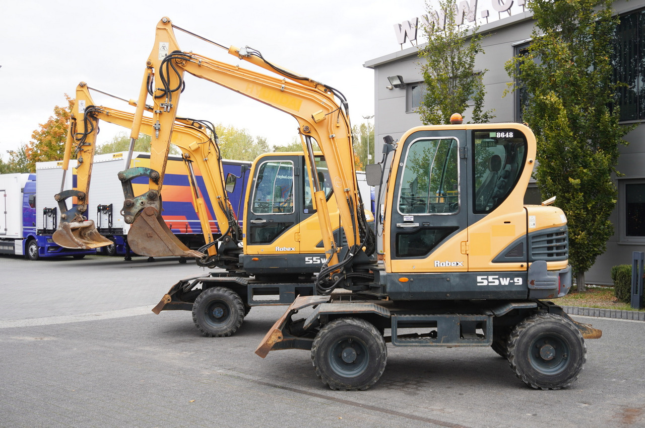 Hyundai Robex 55W-9 Wheeled Excavator 5.5t / 2pcs - Ekskavator mini: gambar 1 Hyundai Robex 55W-9 Wheeled Excavator 5.5t / 2pcs - Ekskavator mini: gambar 1