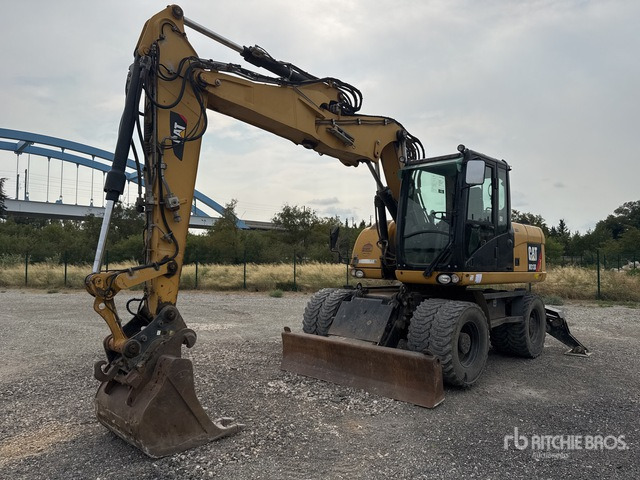 2012 Cat M313D Pelle Sur Pneus Wheel Excavator - Ekskavator roda: gambar 1 2012 Cat M313D Pelle Sur Pneus Wheel Excavator - Ekskavator roda: gambar 1