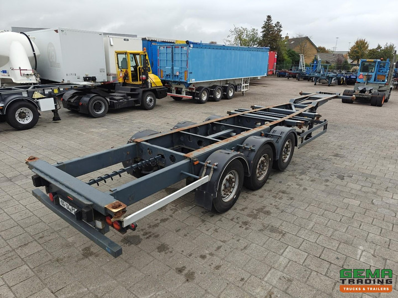 Schmitz Cargobull SCF 24 G 3-Assen MB - LiftAs - Schijfremmen - Vast Chassis - 2x20FT 1x30FT 40FT aansluiting - Semi-trailer pengangkut mobil: gambar 1 Schmitz Cargobull SCF 24 G 3-Assen MB - LiftAs - Schijfremmen - Vast Chassis - 2x20FT 1x30FT 40FT aansluiting - Semi-trailer pengangkut mobil: gambar 1