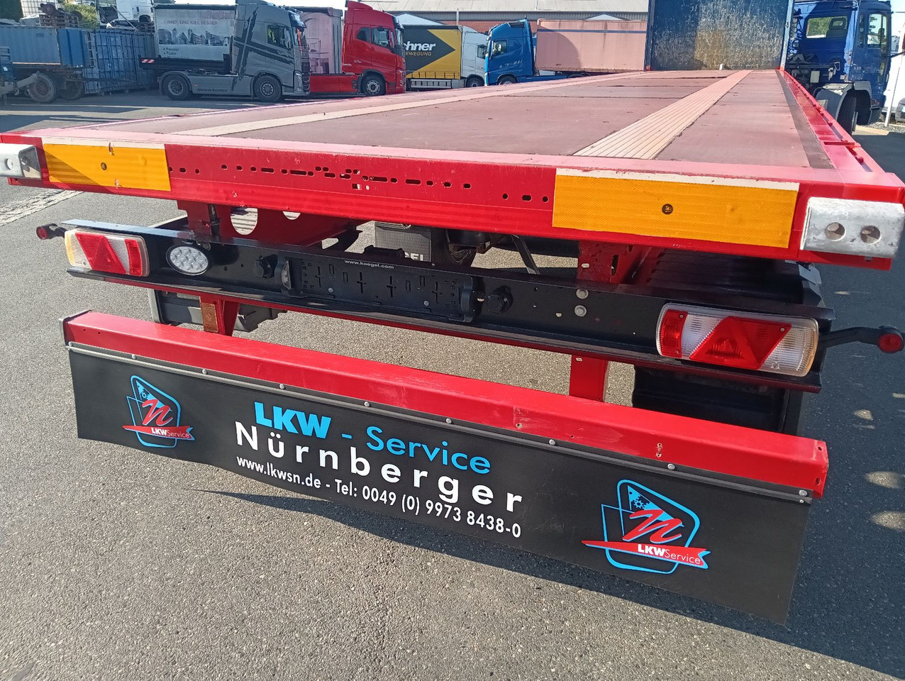 Kögel SN24 Plateau 7xRungen,Palettenkasten, Überbreite - Semi-trailer flatbed: gambar 1 Kögel SN24 Plateau 7xRungen,Palettenkasten, Überbreite - Semi-trailer flatbed: gambar 1