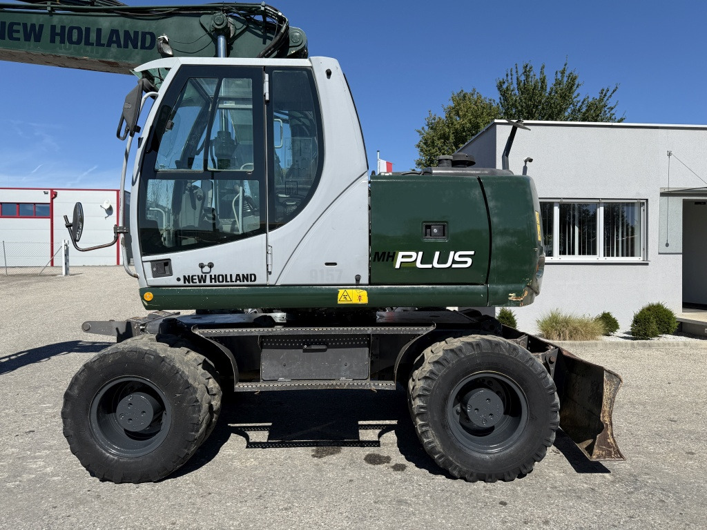 New Holland MH-Plus (111695) - Ekskavator roda: gambar 2 New Holland MH-Plus (111695) - Ekskavator roda: gambar 2
