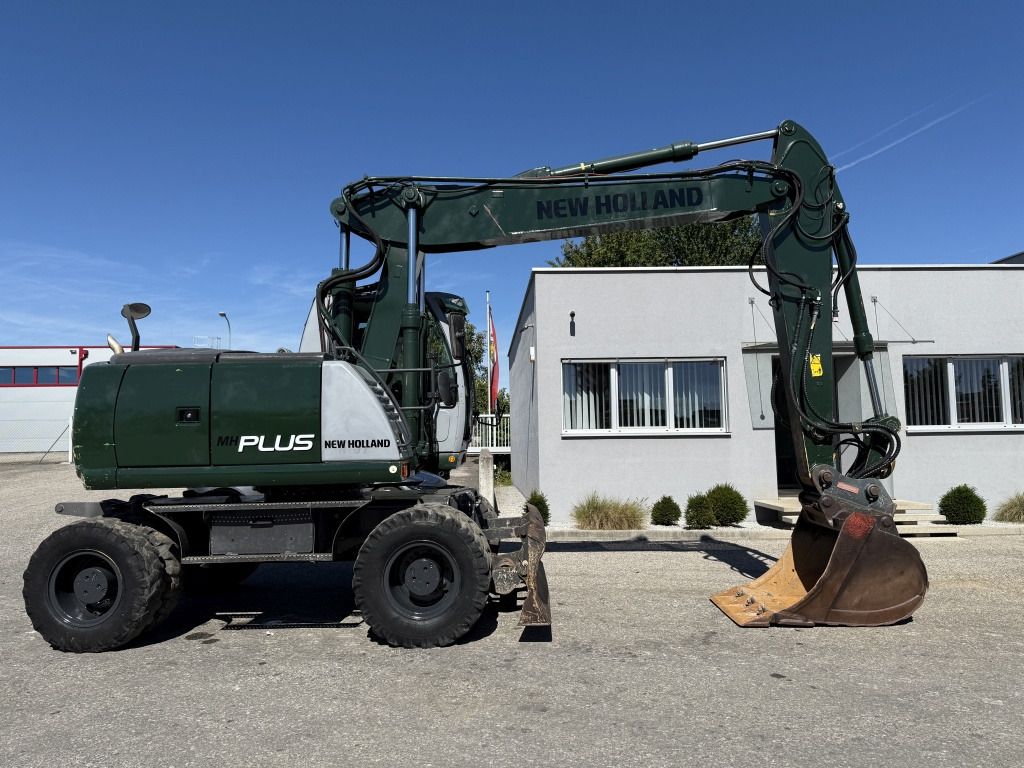 New Holland MH-Plus (111695) - Ekskavator roda: gambar 5 New Holland MH-Plus (111695) - Ekskavator roda: gambar 5