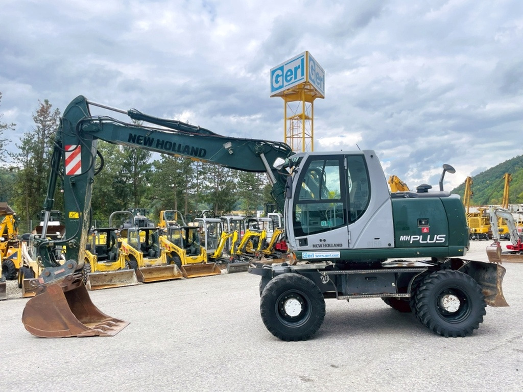 New Holland MH Plus (4054) - Ekskavator roda: gambar 1 New Holland MH Plus (4054) - Ekskavator roda: gambar 1