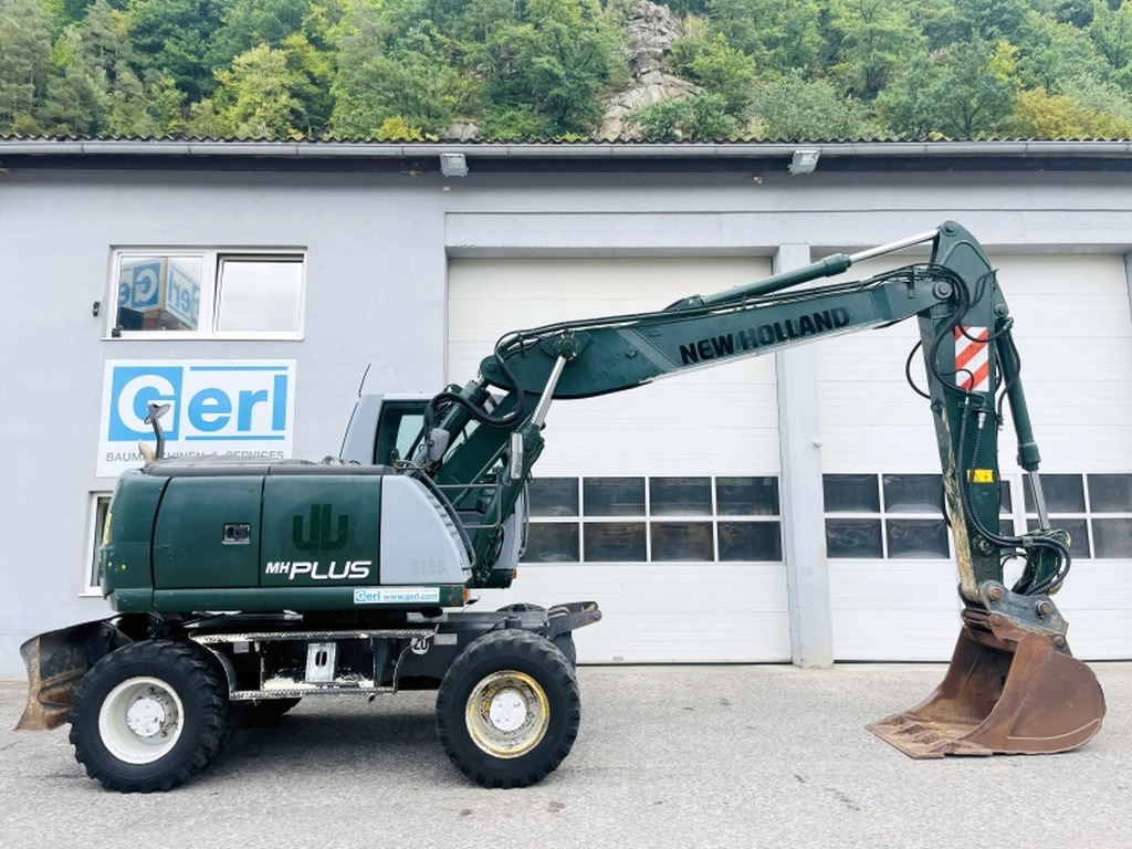 New Holland MH Plus (4054) - Ekskavator roda: gambar 2 New Holland MH Plus (4054) - Ekskavator roda: gambar 2
