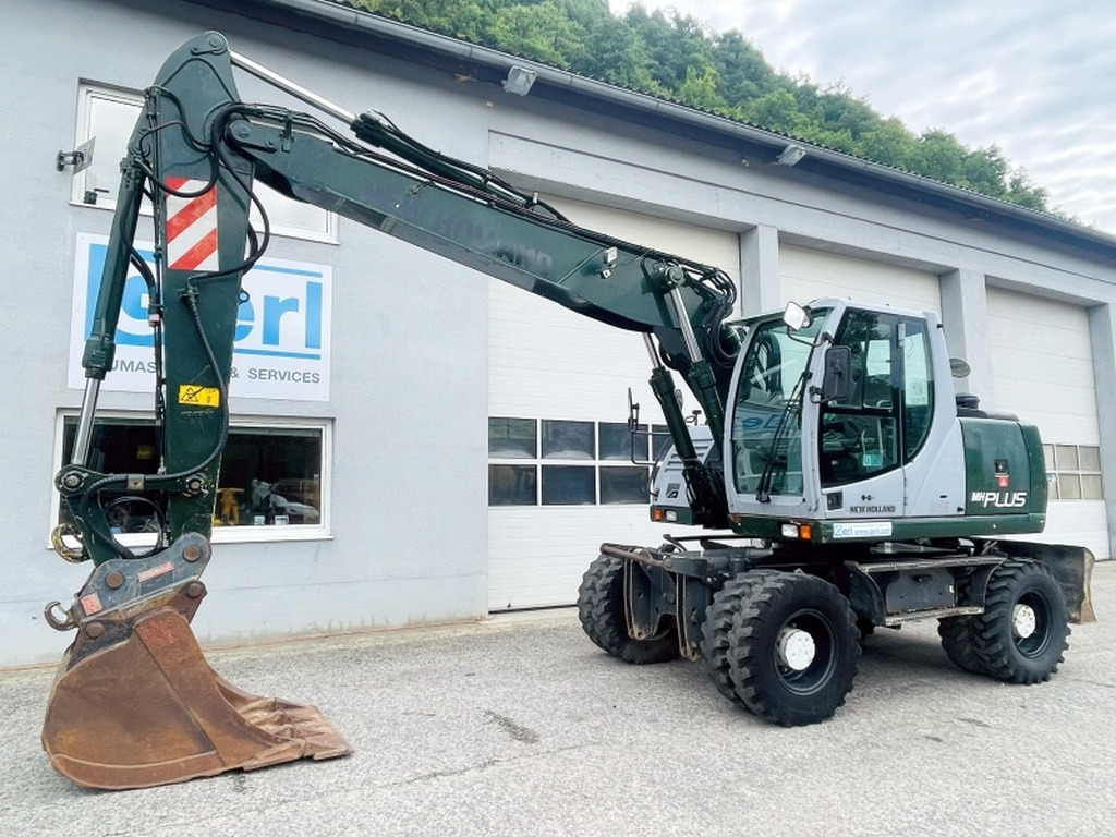 New Holland MH Plus (4054) - Ekskavator roda: gambar 4 New Holland MH Plus (4054) - Ekskavator roda: gambar 4