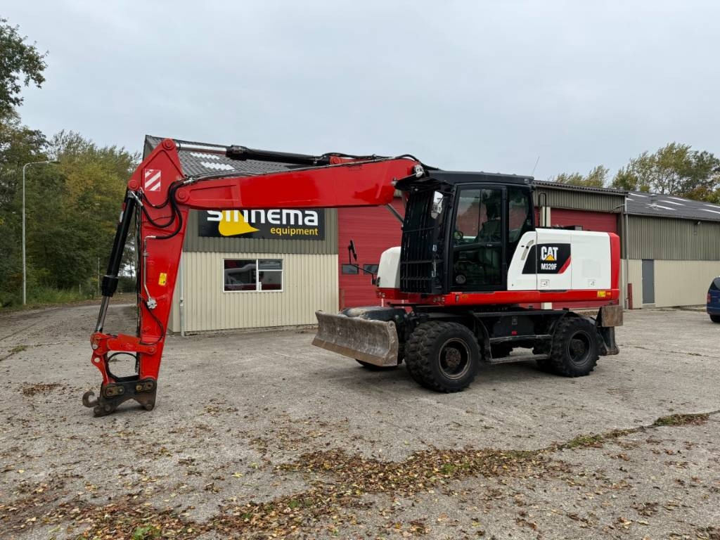 CAT M320F - Ekskavator roda: gambar 1 CAT M320F - Ekskavator roda: gambar 1