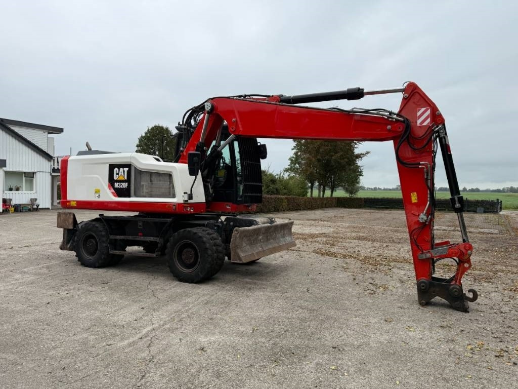CAT M320F - Ekskavator roda: gambar 2 CAT M320F - Ekskavator roda: gambar 2