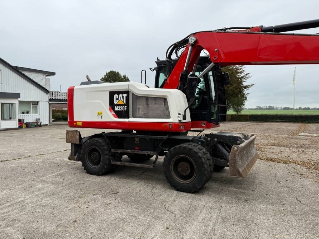 CAT M320F - Ekskavator roda: gambar 5 CAT M320F - Ekskavator roda: gambar 5