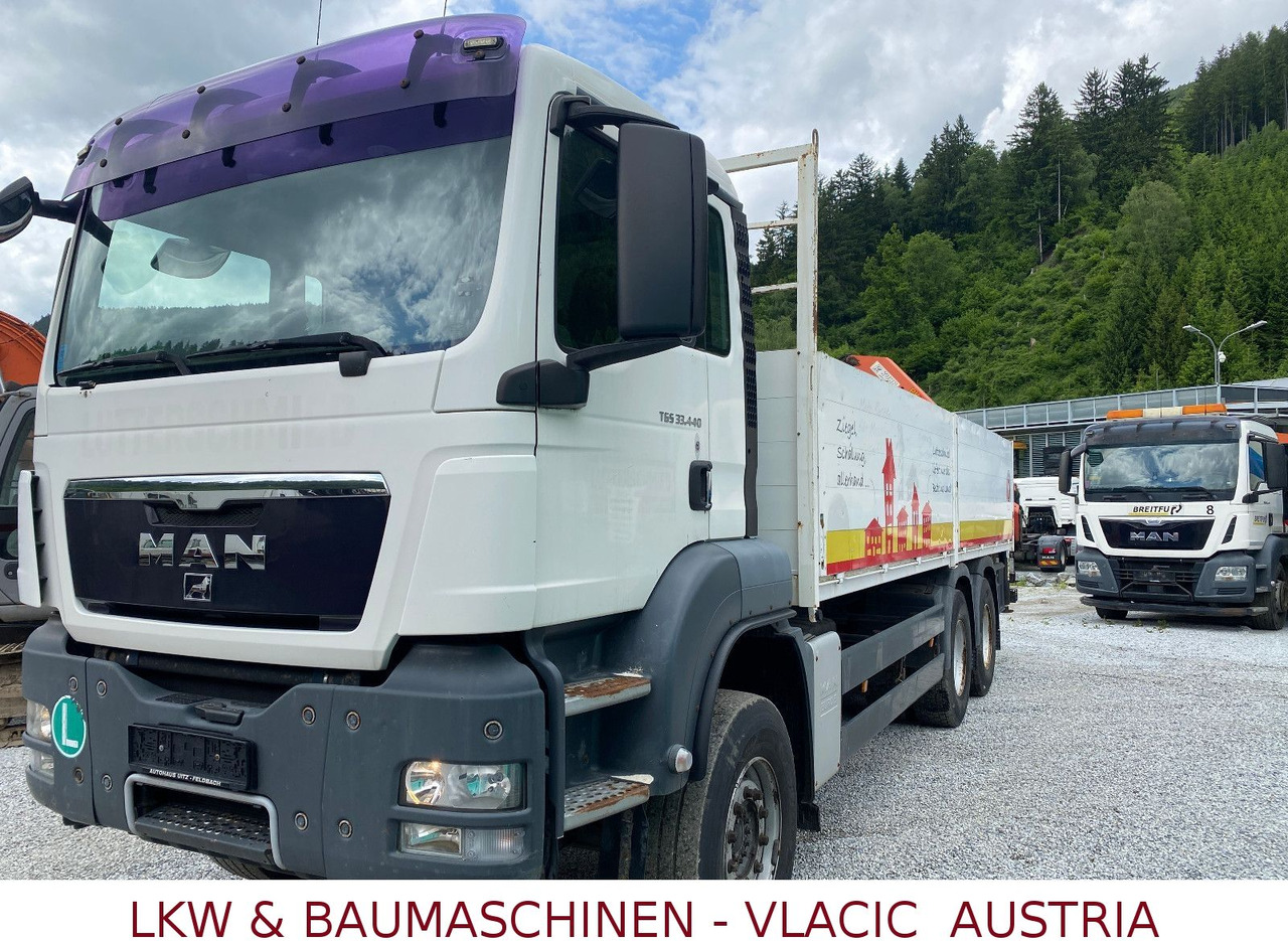 MAN TGS 33.440 6x4 Blatt/Blatt Mit Palfinger PK16500 - Truk flatbed, Truk derek: gambar 1 MAN TGS 33.440 6x4 Blatt/Blatt Mit Palfinger PK16500 - Truk flatbed, Truk derek: gambar 1