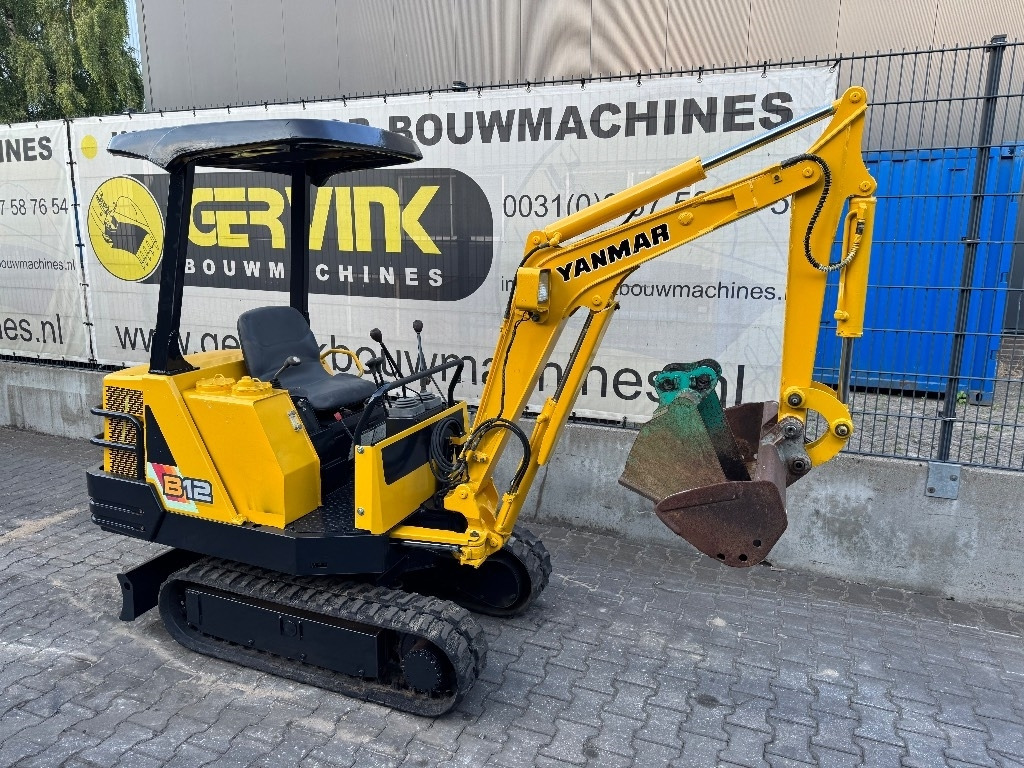 Yanmar B12 - Ekskavator mini: gambar 2 Yanmar B12 - Ekskavator mini: gambar 2