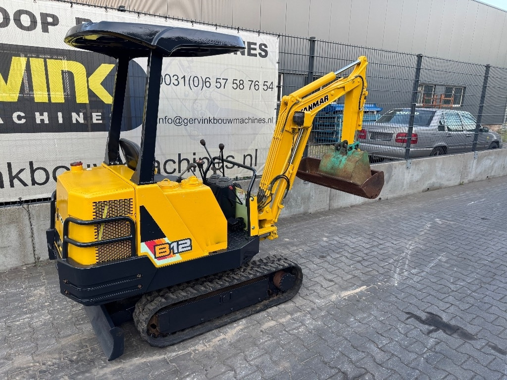 Yanmar B12 - Ekskavator mini: gambar 1 Yanmar B12 - Ekskavator mini: gambar 1