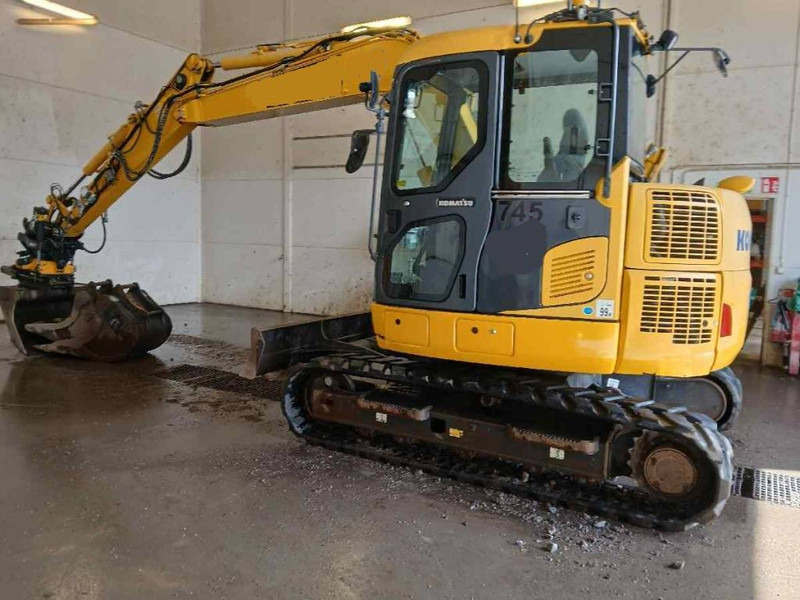 Komatsu PC78US-10 - Ekskavator mini: gambar 1 Komatsu PC78US-10 - Ekskavator mini: gambar 1