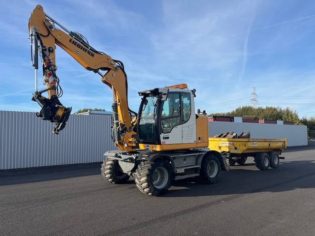 Liebherr A 910 Compact - Ekskavator roda: gambar 1 Liebherr A 910 Compact - Ekskavator roda: gambar 1