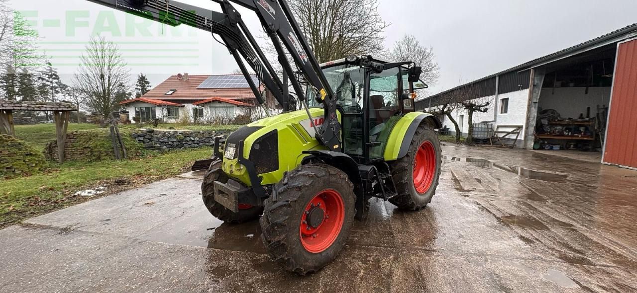 CLAAS Axos 320 C - Traktor: gambar 1 CLAAS Axos 320 C - Traktor: gambar 1
