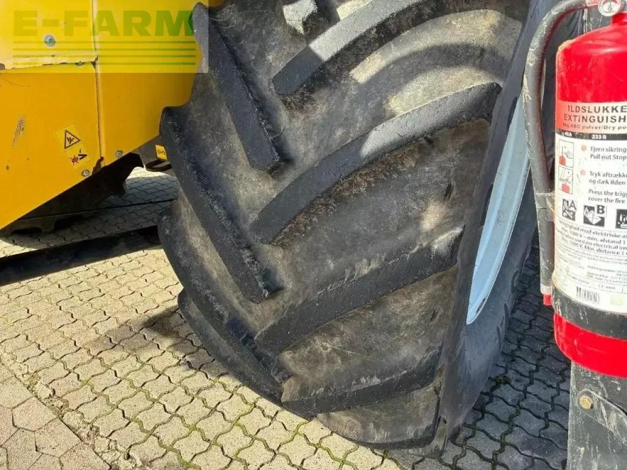 Pemanen gabungan New Holland cr 9080: gambar 12