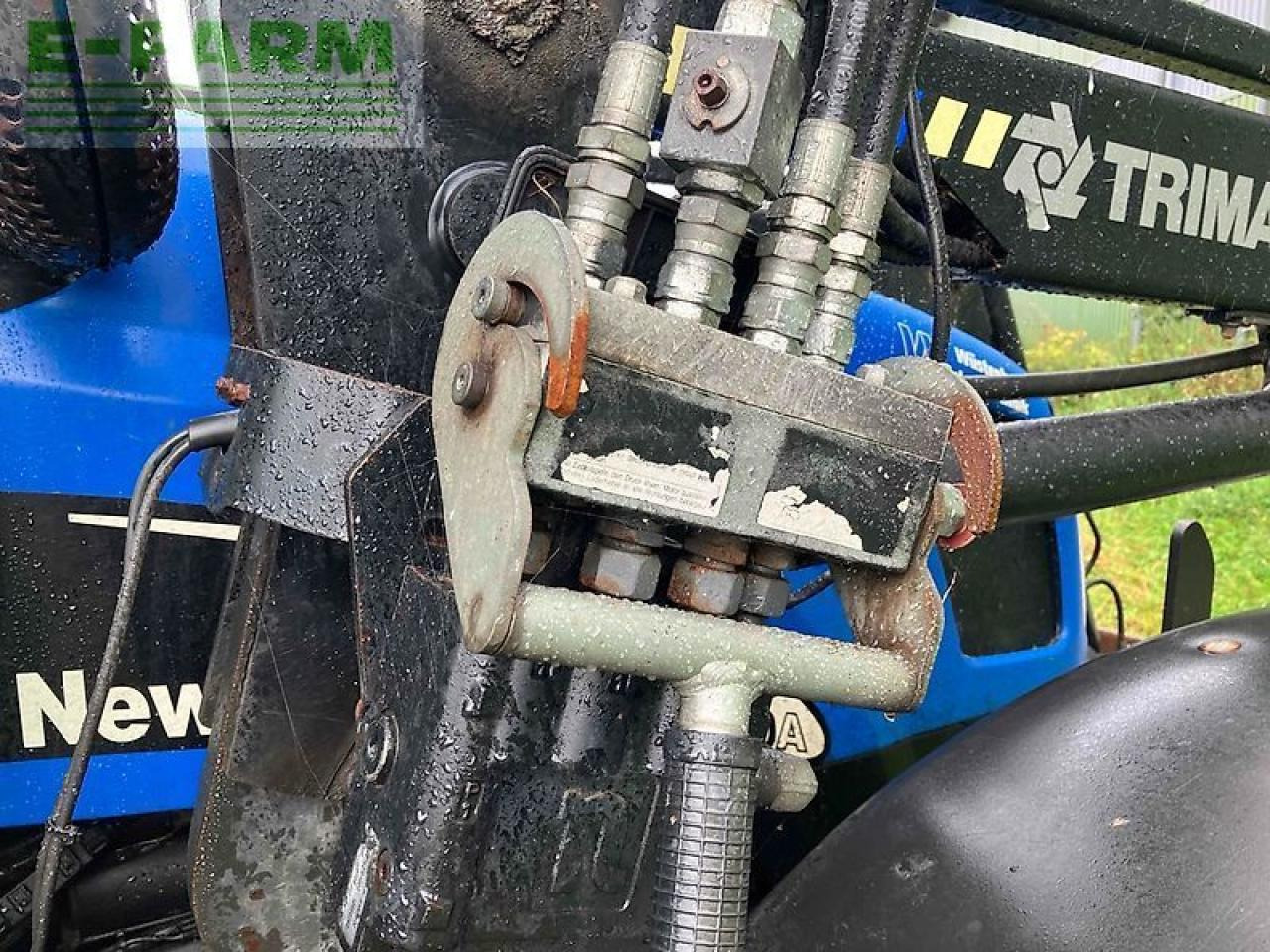 New Holland tl 100 a A - Traktor: gambar 5 New Holland tl 100 a A - Traktor: gambar 5