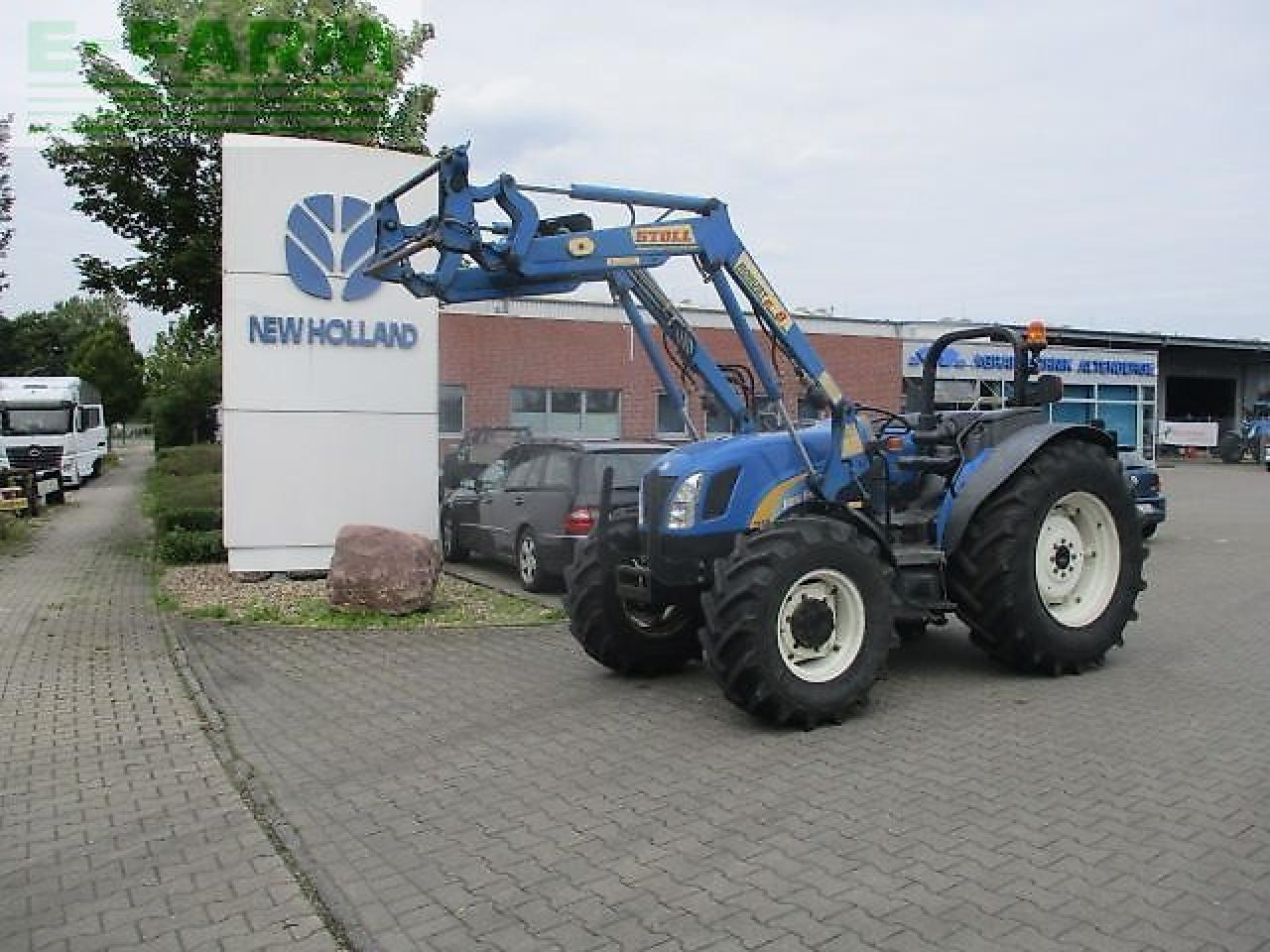 New Holland tn70 a niedrige bauhöhe - Traktor: gambar 1 New Holland tn70 a niedrige bauhöhe - Traktor: gambar 1