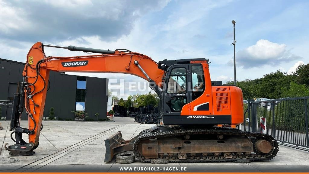 Doosan Kettenbagger DX 235 LCR-5, hyd. SW OilQuick 70-55 - Ekskavator perayap: gambar 3 Doosan Kettenbagger DX 235 LCR-5, hyd. SW OilQuick 70-55 - Ekskavator perayap: gambar 3