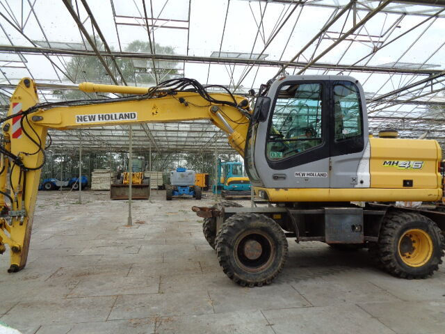 New Holland MH 4.6 - Ekskavator roda: gambar 1 New Holland MH 4.6 - Ekskavator roda: gambar 1