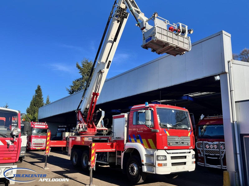 MAN TGA 26.350 Magirus ALP 320L = 32 meter, Waterpomp, 6x4, Bladgeveerd - Truk pemadam kebakaran: gambar 2 MAN TGA 26.350 Magirus ALP 320L = 32 meter, Waterpomp, 6x4, Bladgeveerd - Truk pemadam kebakaran: gambar 2