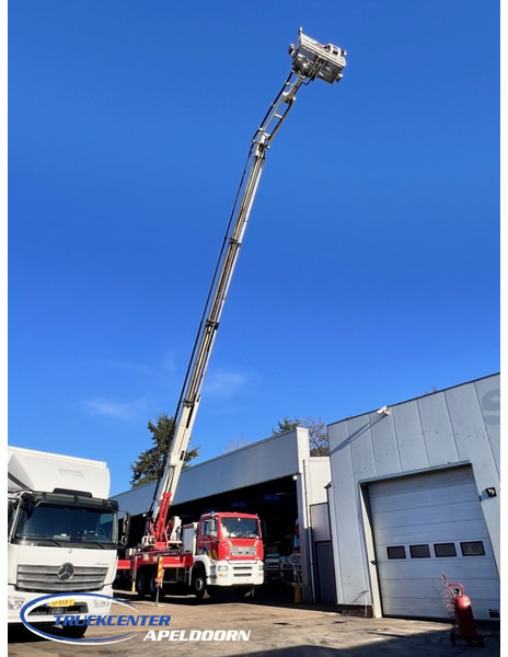 MAN TGA 26.350 Magirus ALP 320L = 32 meter, Waterpump, 6x4, Steel springs - Truk pemadam kebakaran: gambar 1 MAN TGA 26.350 Magirus ALP 320L = 32 meter, Waterpump, 6x4, Steel springs - Truk pemadam kebakaran: gambar 1
