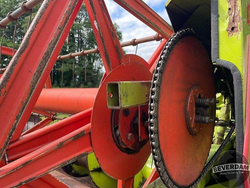 Lampiran pemanen Claas maaibord 400: gambar 12