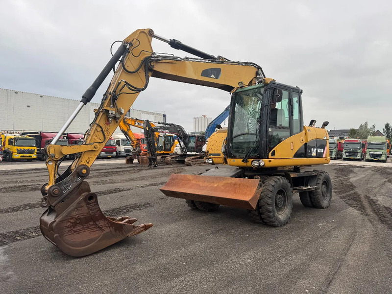 Caterpillar M313D 7212 HOURS - Ekskavator roda: gambar 4 Caterpillar M313D 7212 HOURS - Ekskavator roda: gambar 4