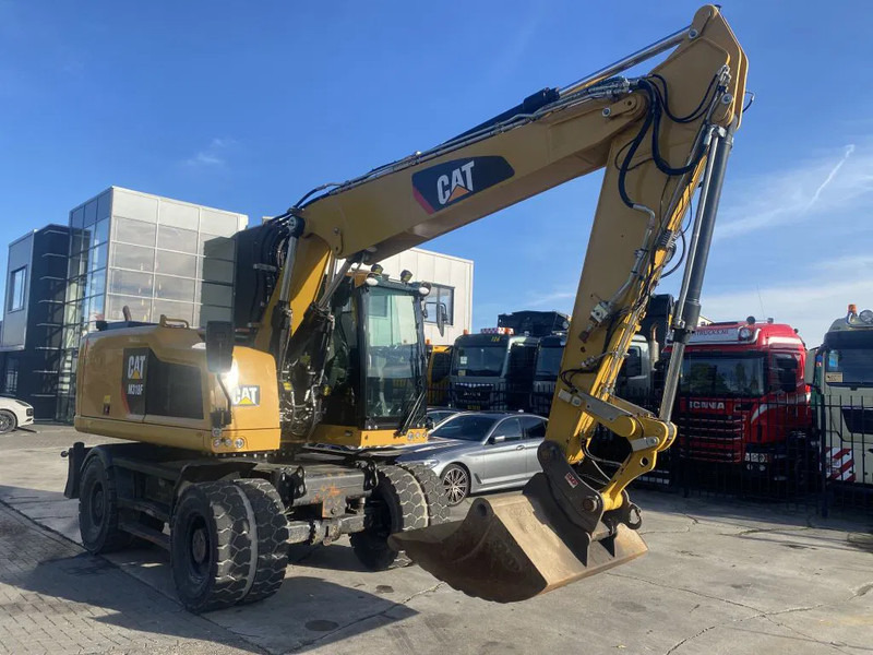 Caterpillar M318F - Ekskavator roda: gambar 3 Caterpillar M318F - Ekskavator roda: gambar 3