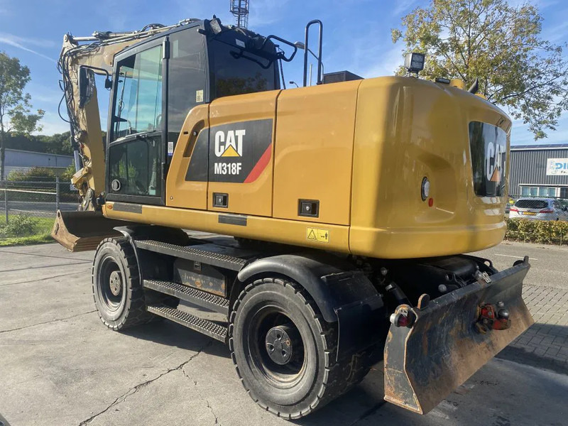 Caterpillar M318F - Ekskavator roda: gambar 4 Caterpillar M318F - Ekskavator roda: gambar 4