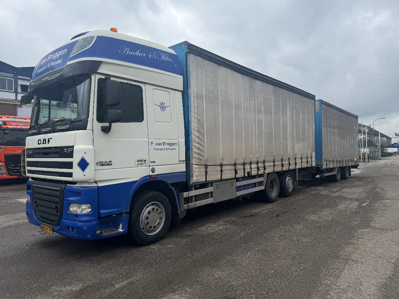 DAF XF 105.410 6X2 EURO 5 + GROENEWEGEN HANGER - Truk dengan terpal samping: gambar 1 DAF XF 105.410 6X2 EURO 5 + GROENEWEGEN HANGER - Truk dengan terpal samping: gambar 1