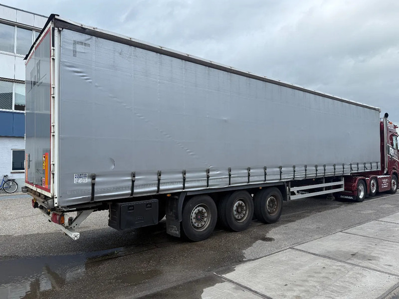 Kässbohrer XS - 3 AXLE - SAF + SLIDING ROOF - DISC BRAKES - Semi-trailer dengan terpal samping: gambar 4 Kässbohrer XS - 3 AXLE - SAF + SLIDING ROOF - DISC BRAKES - Semi-trailer dengan terpal samping: gambar 4