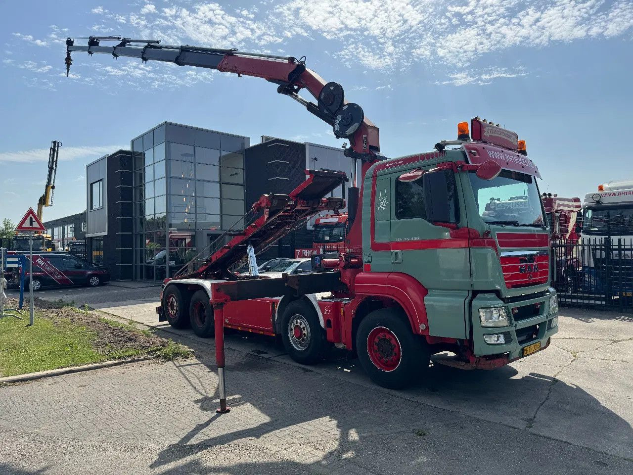 MAN TGS 35.480 8X4 HMF 2420 K5 + HMF ABLE + REMOTE C - Hook lift, Truk derek: gambar 1 MAN TGS 35.480 8X4 HMF 2420 K5 + HMF ABLE + REMOTE C - Hook lift, Truk derek: gambar 1