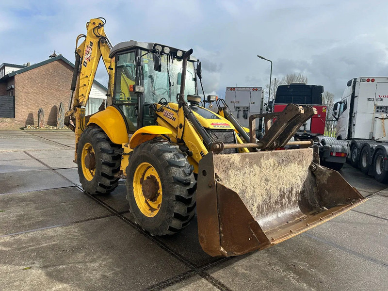 New Holland LB115B, CE, 240 MM MULTI PURPOSE LOADER BUCKET, 800 MM BACHOE DIGGING BUCKET, FLIP OVER FORKS, AIR CONDITIONER - Backhoe loader: gambar 5 New Holland LB115B, CE, 240 MM MULTI PURPOSE LOADER BUCKET, 800 MM BACHOE DIGGING BUCKET, FLIP OVER FORKS, AIR CONDITIONER - Backhoe loader: gambar 5