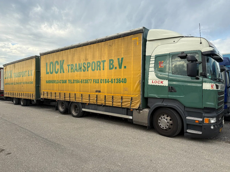 Scania R450 6X2 + DRACO AANHANGER 2010 TUV TILL 17-08-2026 - Truk dengan terpal samping: gambar 1 Scania R450 6X2 + DRACO AANHANGER 2010 TUV TILL 17-08-2026 - Truk dengan terpal samping: gambar 1