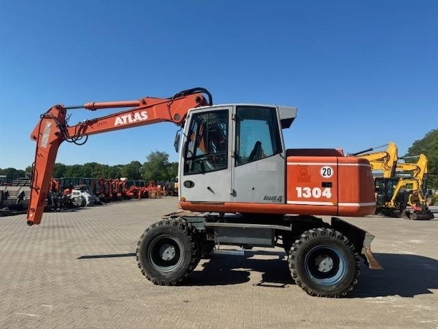 ATLAS 1304 M - Ekskavator roda: gambar 2 ATLAS 1304 M - Ekskavator roda: gambar 2