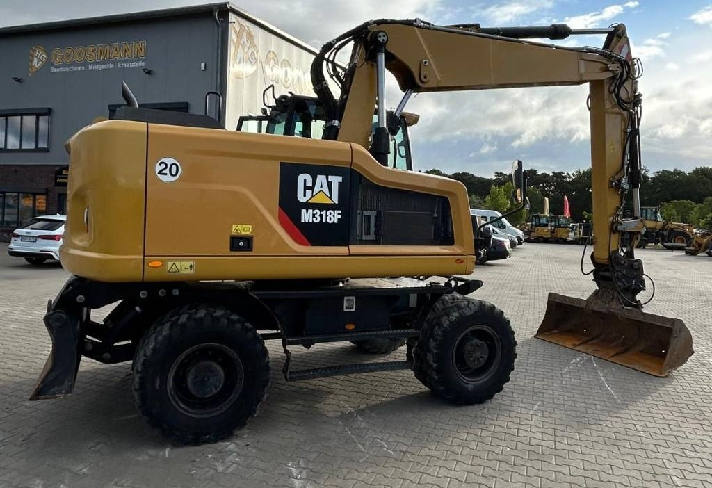 CAT M 318 F - Ekskavator roda: gambar 2 CAT M 318 F - Ekskavator roda: gambar 2