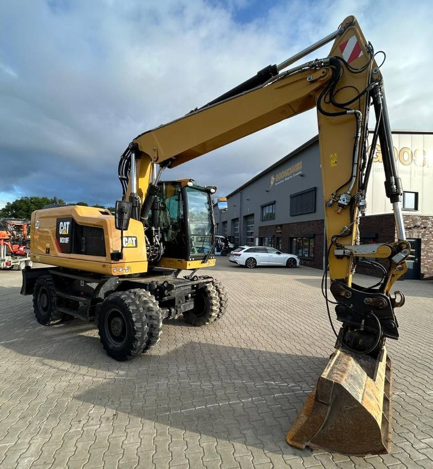 CAT M 318 F - Ekskavator roda: gambar 1 CAT M 318 F - Ekskavator roda: gambar 1