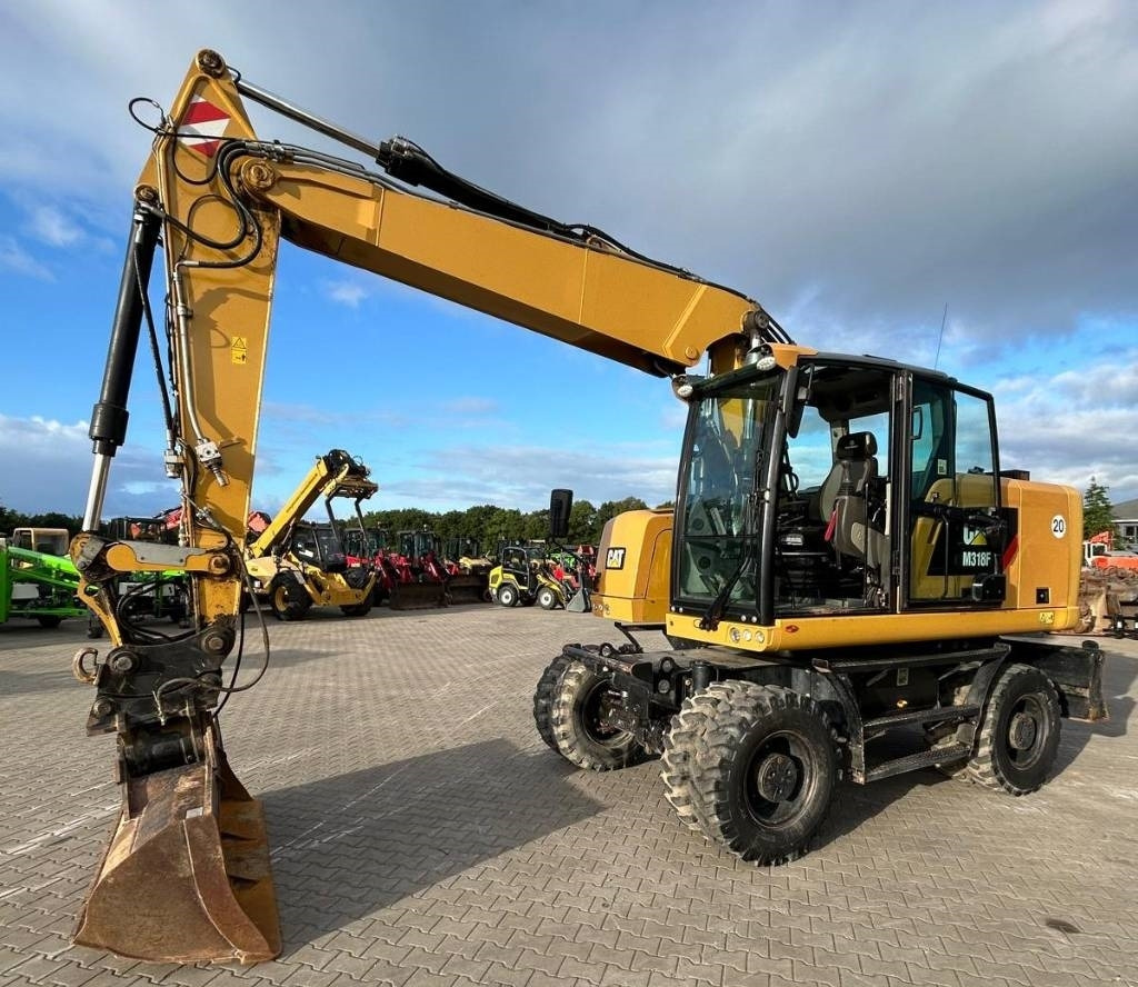CAT M 318 F - Ekskavator roda: gambar 1 CAT M 318 F - Ekskavator roda: gambar 1